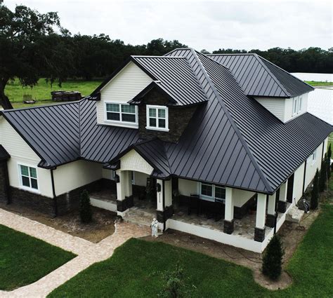 homes with black metal roofs